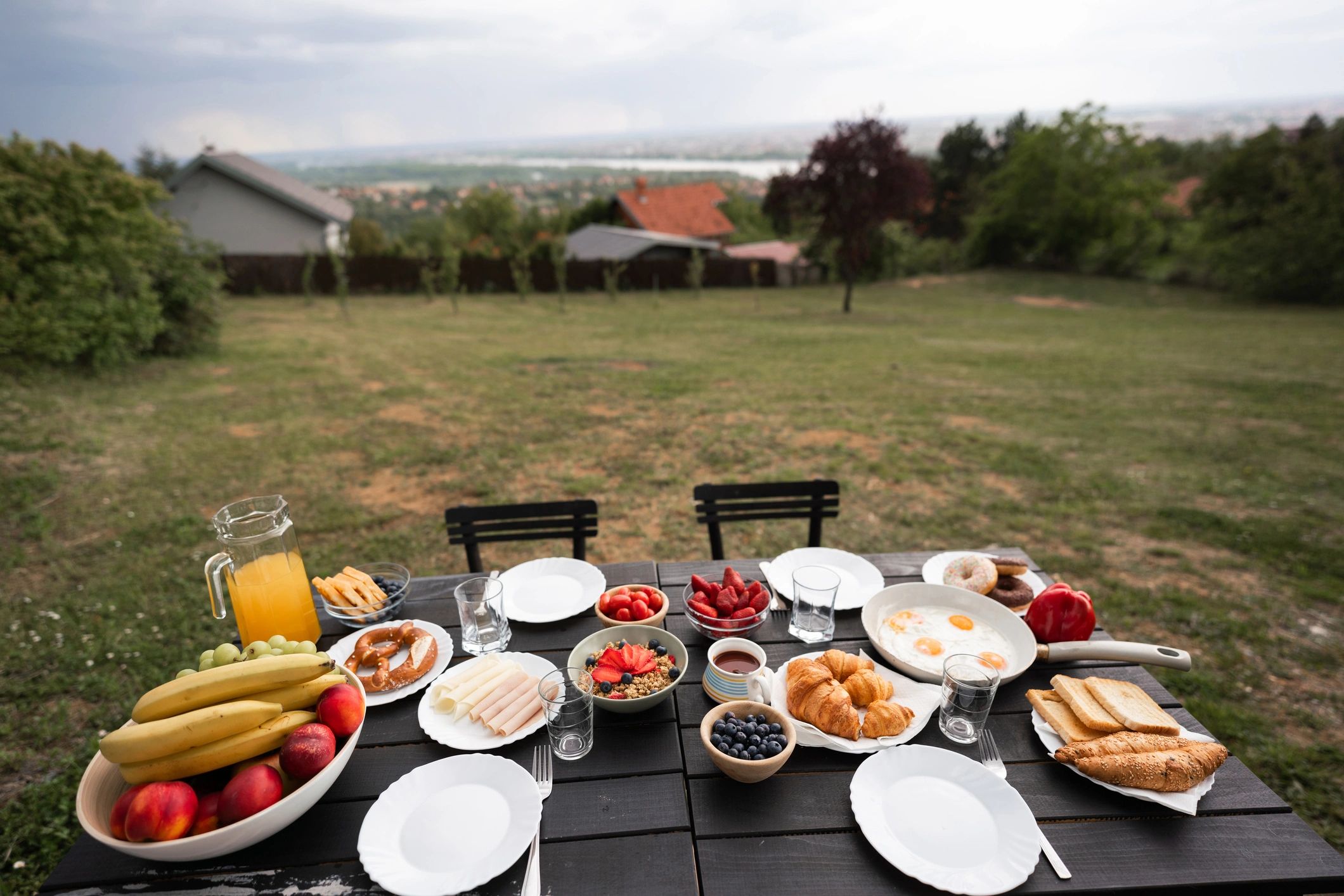 Breakfast table set outdoors in a garden