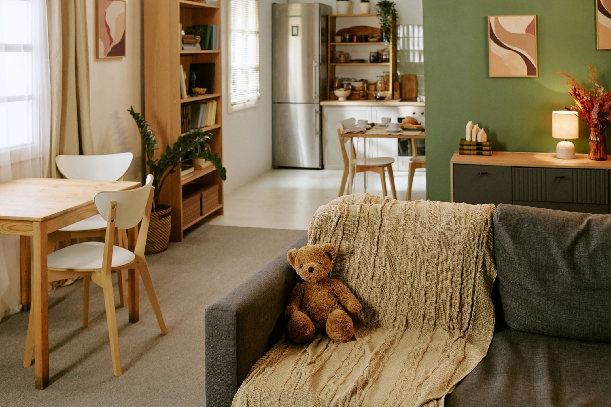 Cozy sofa corner with a teddy bear